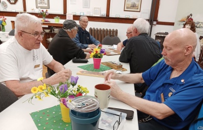 Everyone likes playing a game of cards. Very popular in Didsbury.
